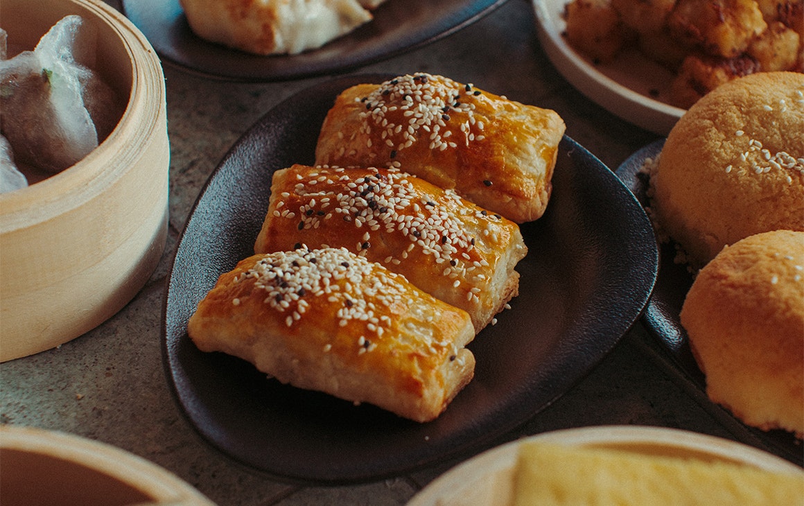 a plate of wrapped rolls